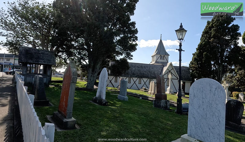 All Saints Anglican Church in Howick, Auckland with gravestones - Woodward Culture