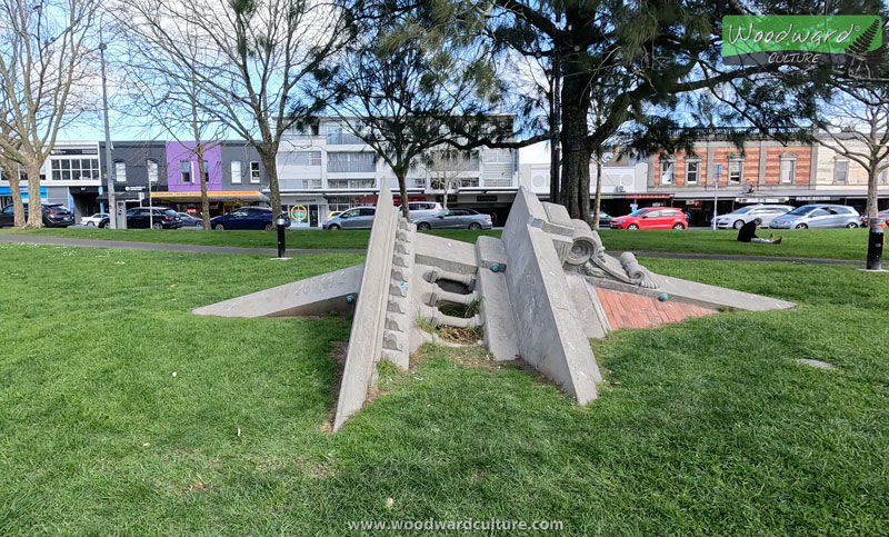 Fallen Building Buried Sculpture in a park in Ponsonby, Auckland, New Zealand - Woodward Culture