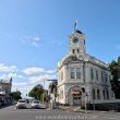 Old Ponsonby Post Office Building with Sky Tower in the distance - Auckland, New Zealand - Woodward Culture