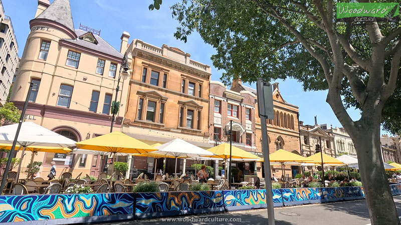 Old buildings and outdoor restaurant tables at The Rocks, Sydney Australia - Woodward Culture