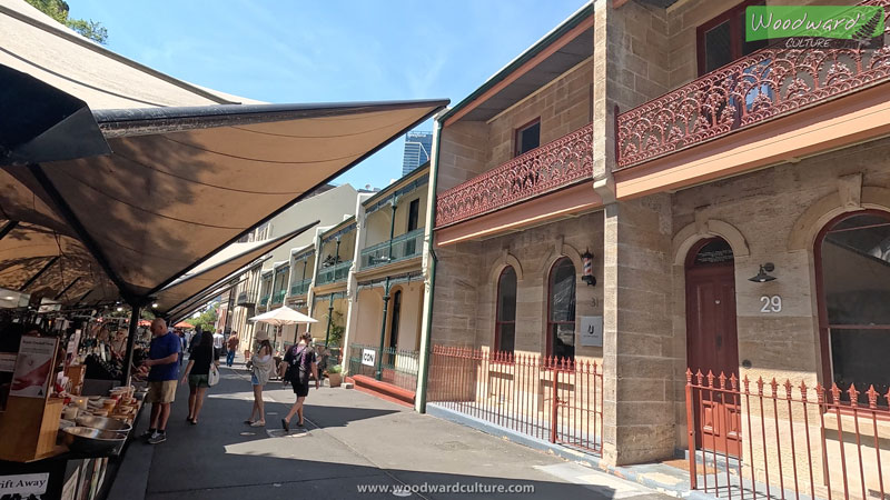 The Rocks Sunday Markets and houses with balconies, Sydney Australia - Woodward Culture